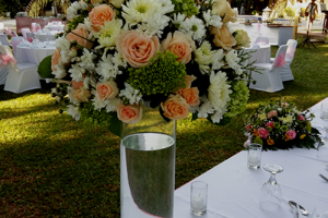Rose -gerbera centerpiece in tall vas.jpg
